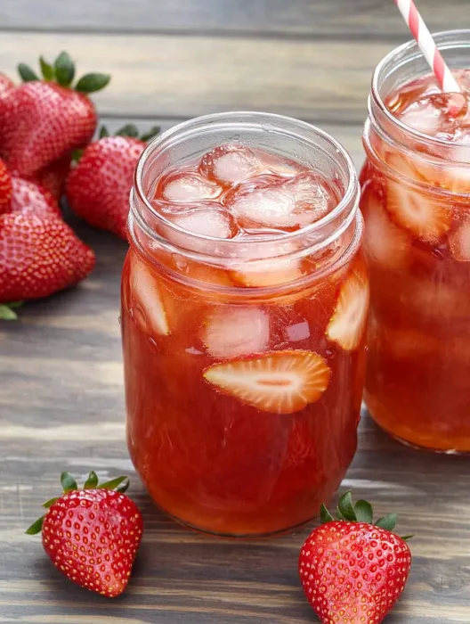 Two jars of Southern Strawberry Sweet Iced Tea.