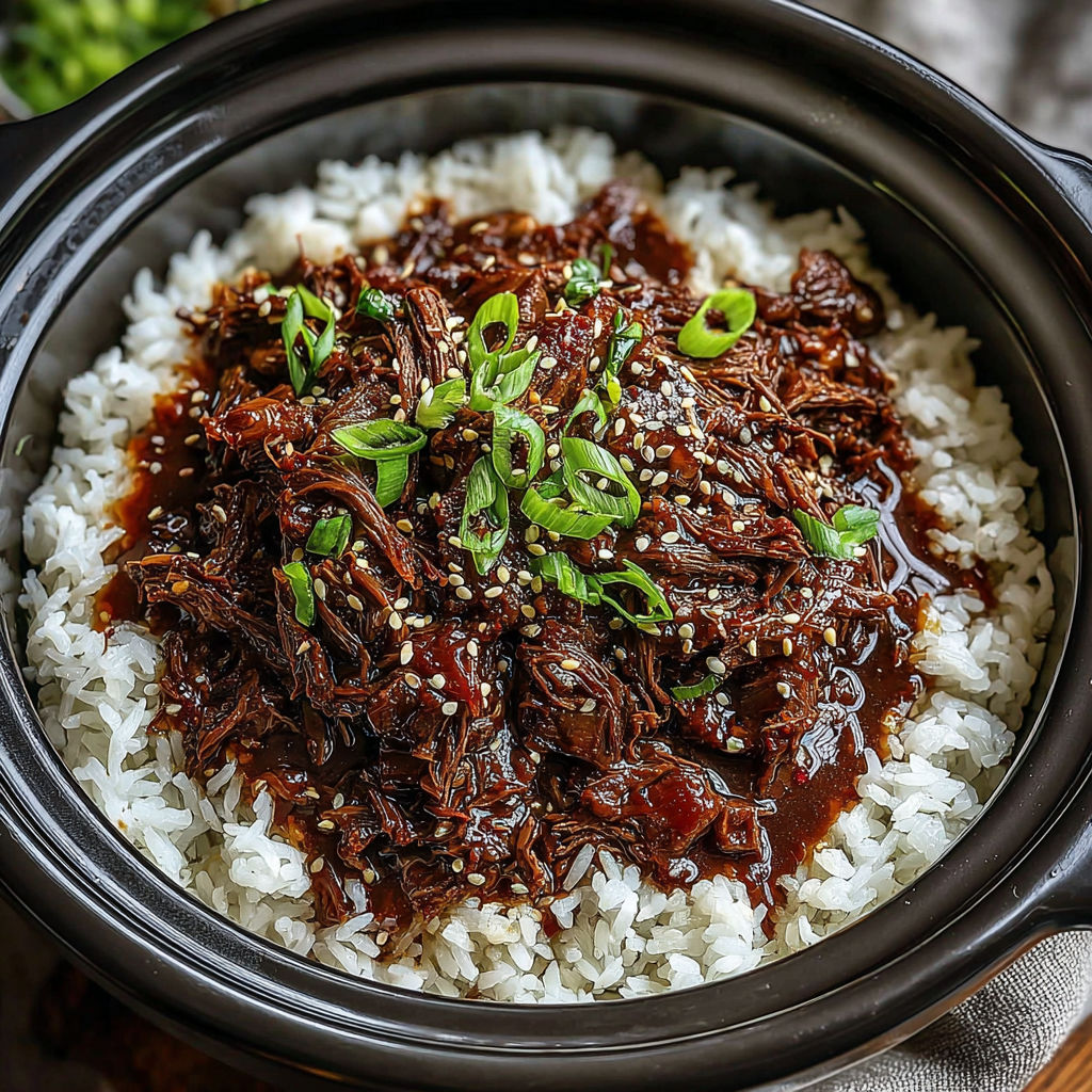A close up of a slow cooker with beef in it.