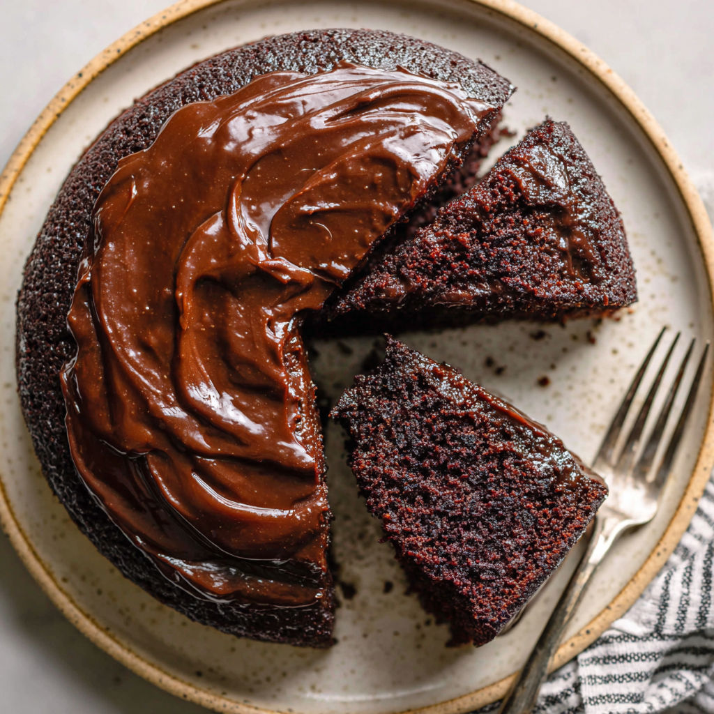 A slice of chocolate cake on a plate.