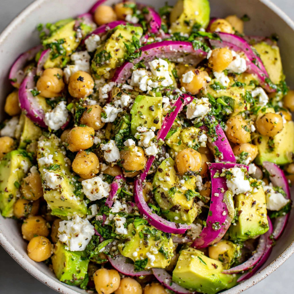 A bowl of chickpea feta avocado salad.
