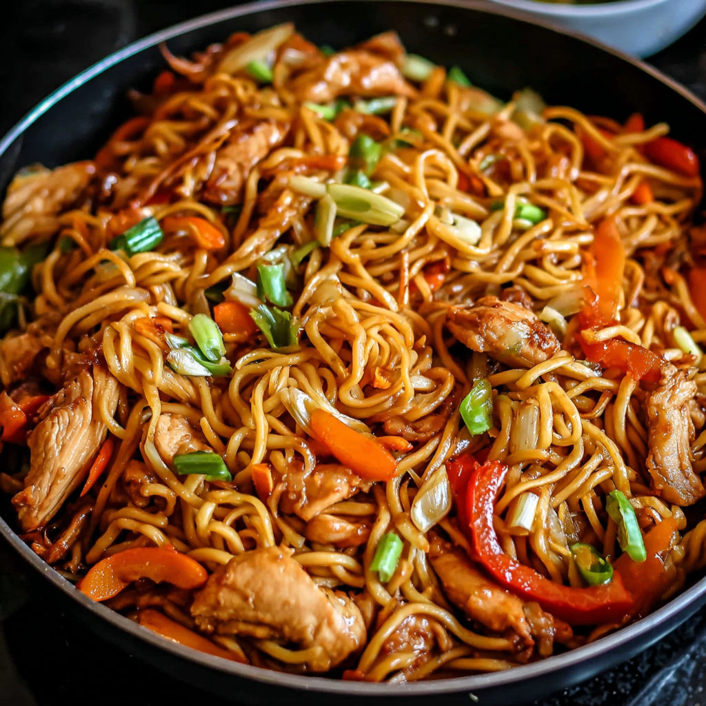 A bowl of chicken lo mein.