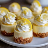 A plate of mini lemon cheesecakes.