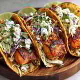 A plate of air fryer salmon tacos with slaw.