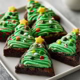 A plate of Christmas tree brownie bites.