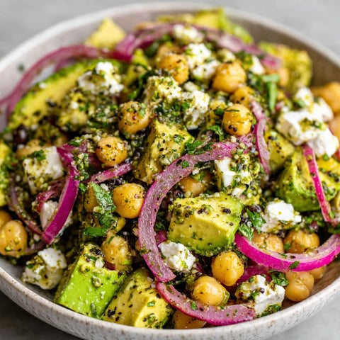 A bowl of chickpea feta avocado salad.