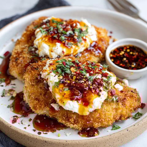 A plate of crispy hot honey feta chicken.